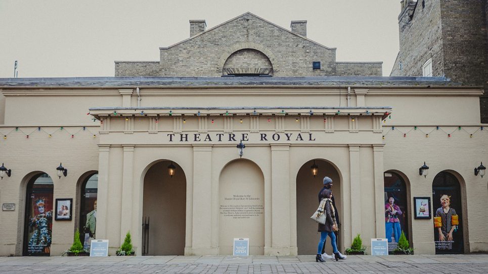 Couple strolling Theatre Royal Unqiuely Emily Jackaman 965x540