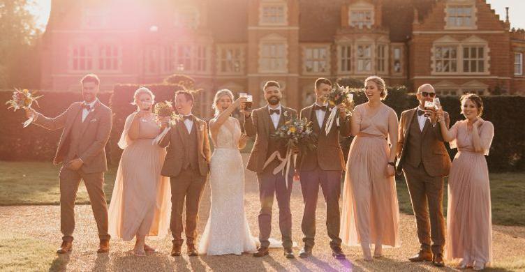 Haughley Park Barn wedding party 750x390